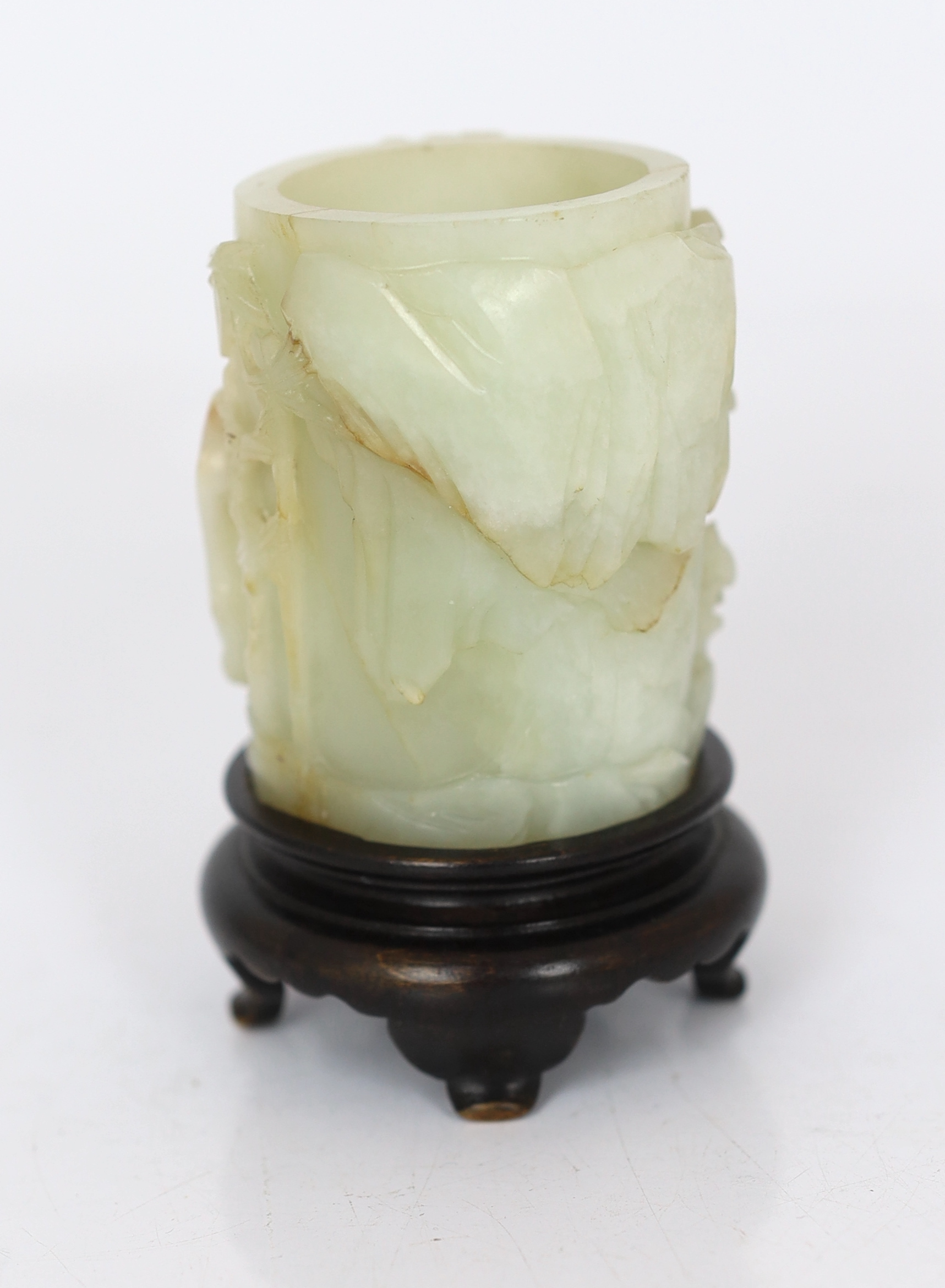 A Chinese pale celadon and russet jade brush pot, bitong, 18th century